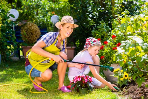 Professional team clearing branches and bulky garden waste